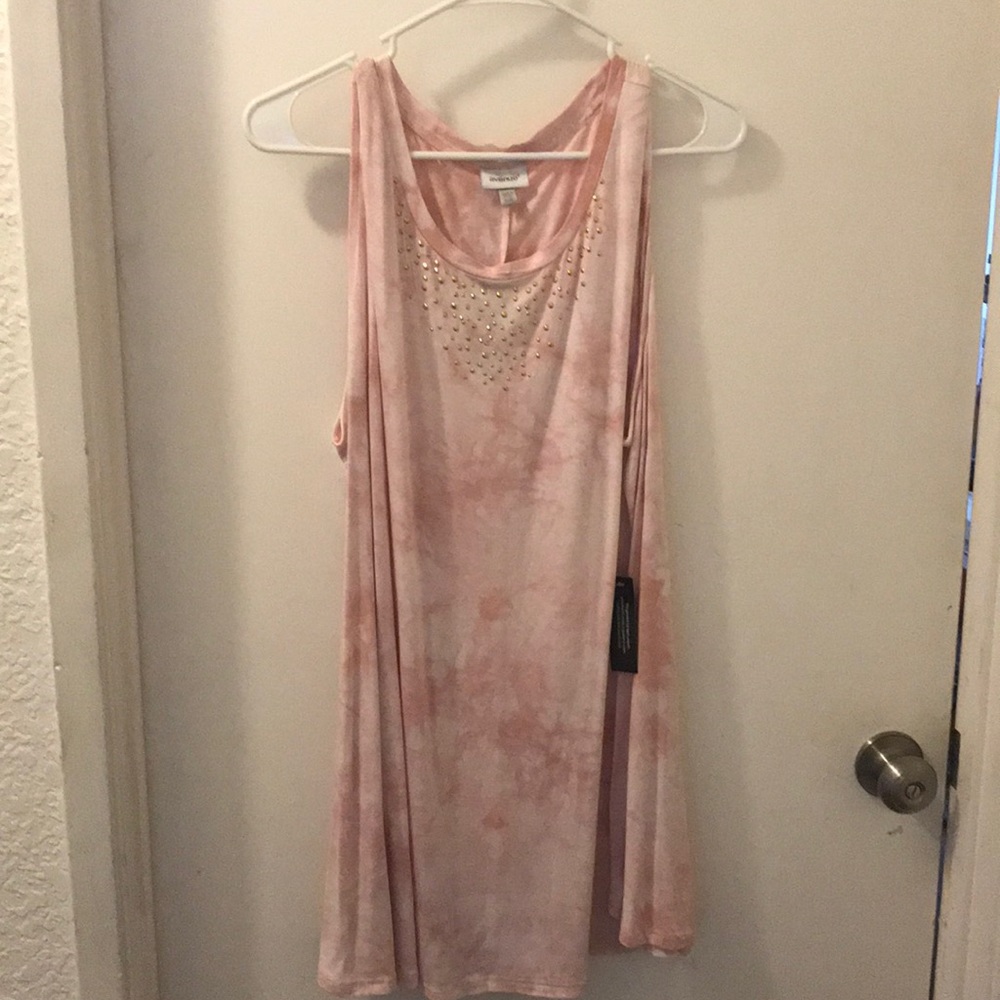 Pale pink sleeveless blouse